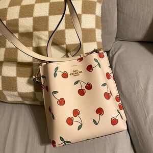 I am selling this Coach Bag